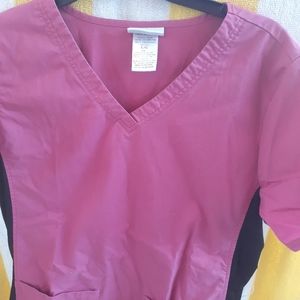 Fitted pink and black scrub top